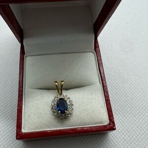18 K genuine, blue, sapphire, and genuine, diamond pendant